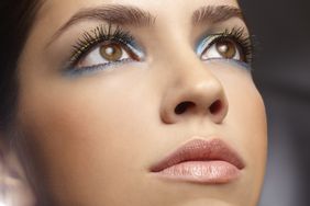 Woman with metallic eye make-up