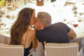 George Clooney y Amal en italia besandose